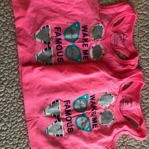 Two Carter’s tank tops